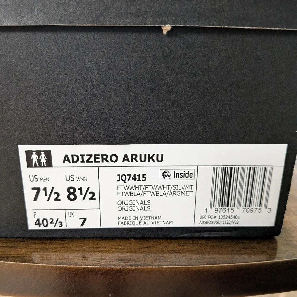 Adidas White and Gray Adizero Aruku Athletic Shoes